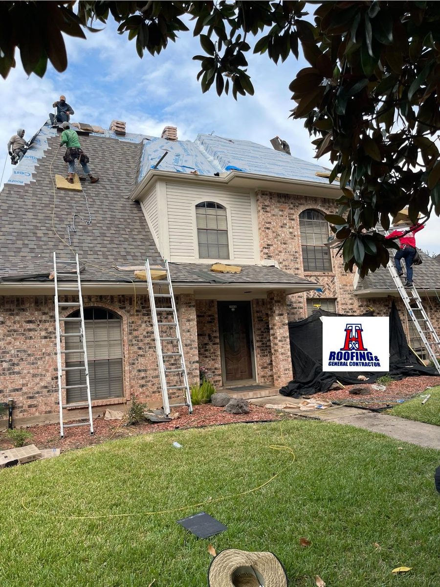 HTX Roofing crew working on a roof